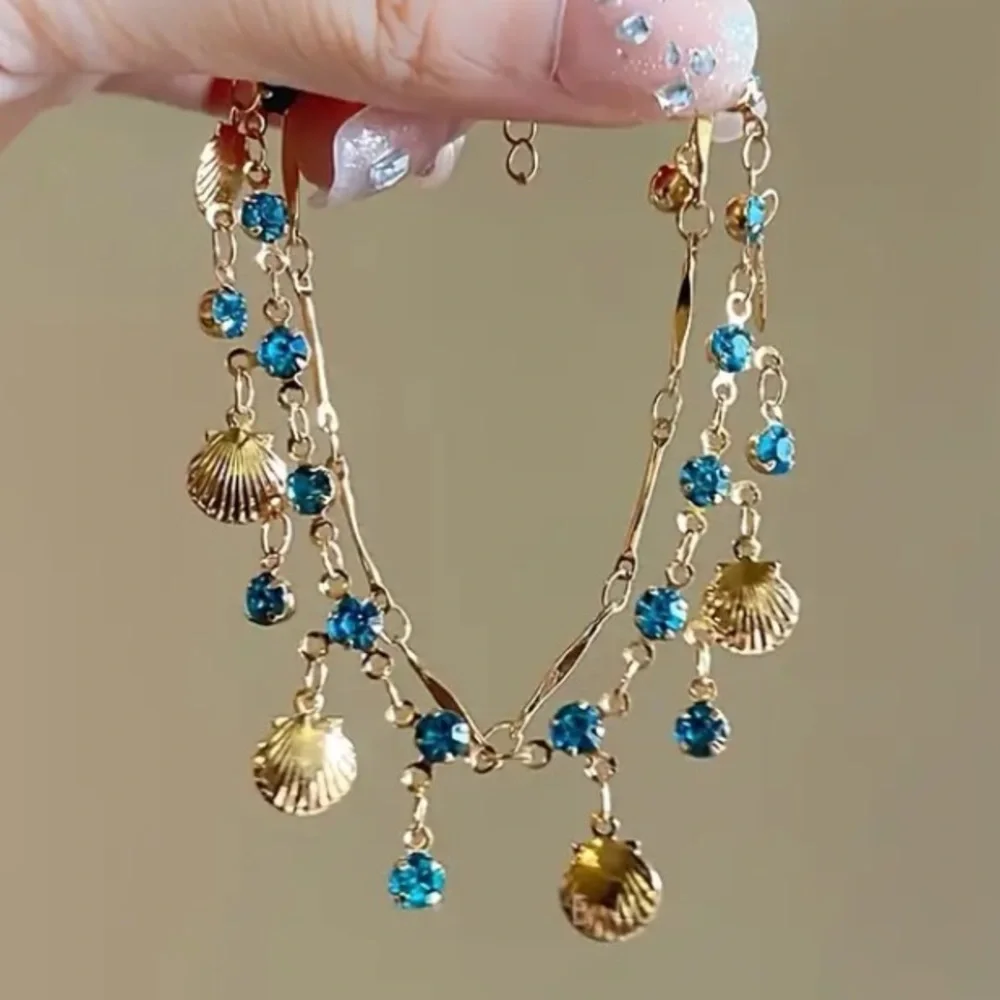 Blue Crystal & Shell Gold Toned Necklace & Bracelet Set - Picture 4 of 5
